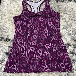 Purple Reebok shirt